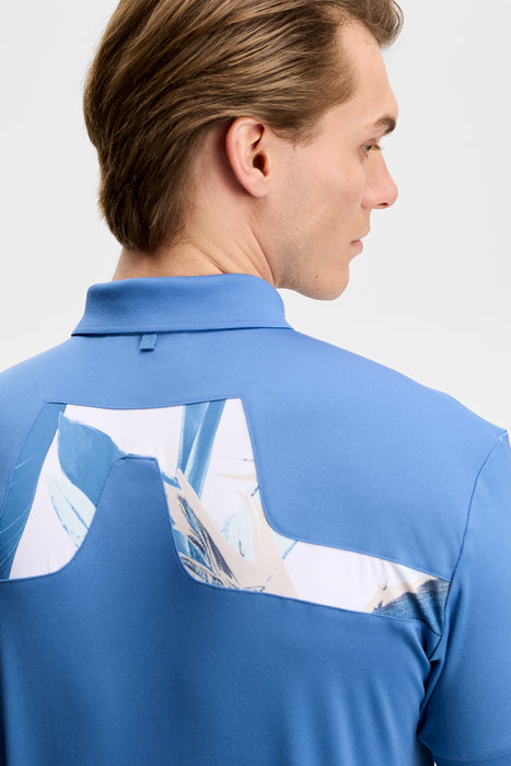 J.Lindeberg KV Print Golf Polo Shirt in federal blue on model. close up of back
