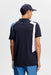 J.Lindeberg Legacy Golf Polo Shirt in navy on model, facing away showing back of golf shirt