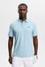 J.Lindeberg Kofe Golf Polo Shirt - in light blue on model facing forwards showing front of shirt