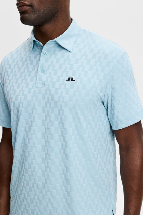 J.Lindeberg Kofe Golf Polo Shirt in light blue, close up of models front