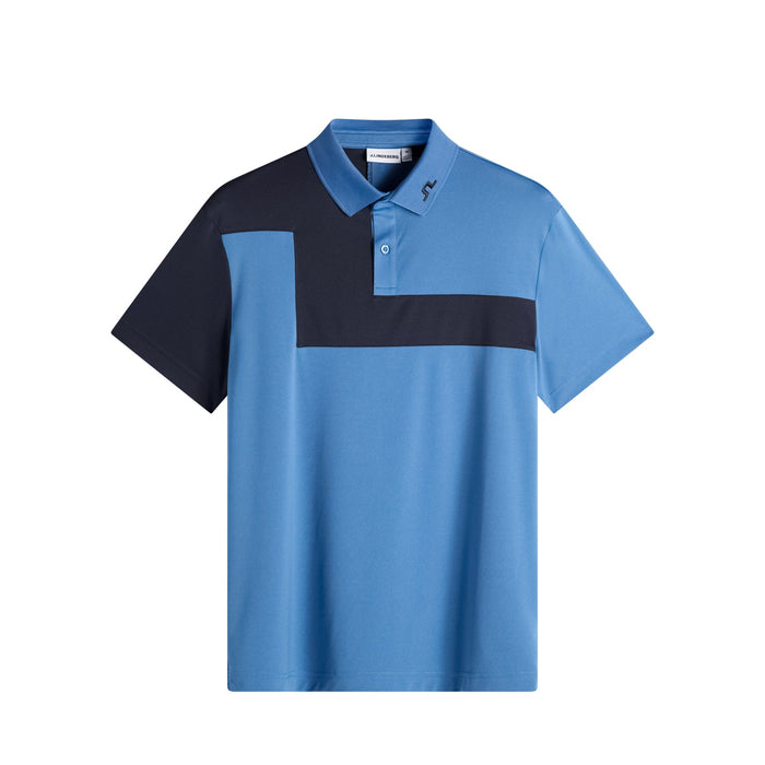 J.Lindeberg Rody Golf Polo Shirt in federal blue with black block pattern. Front view