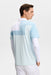 J.Lindeberg Rody Golf Polo Shirt in skylight blue on a model facing away showing the back design