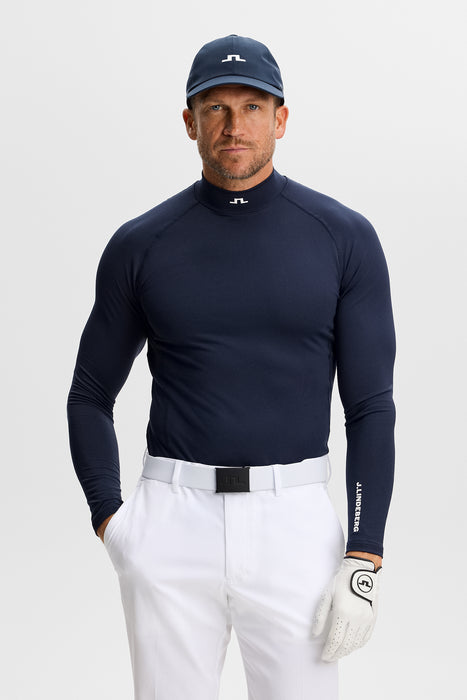 front facing model wearing the J.Lindeberg Ello Brushed Top Golf Base Layer in navy