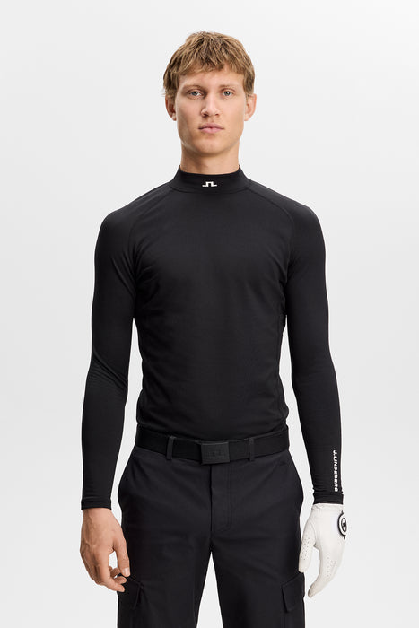 front facing model wearing J.Lindeberg Ello Brushed Top Golf Base Layer in black