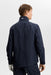back of male model wearing J.Lindeberg Shay Rain Waterproof Golf Jacket in navy