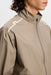 J.Lindeberg Shay Rain Waterproof Golf Jacket in beige on model close up