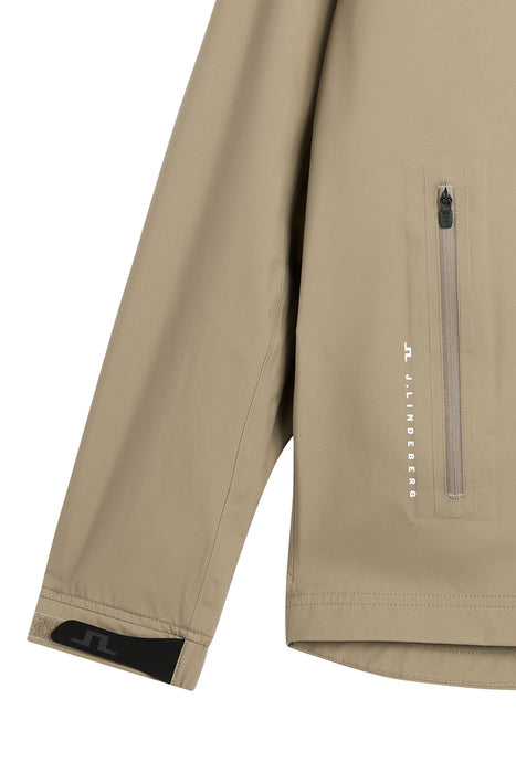 close up of pocket on the beige J.Lindeberg Shay Rain Waterproof Golf Jacket