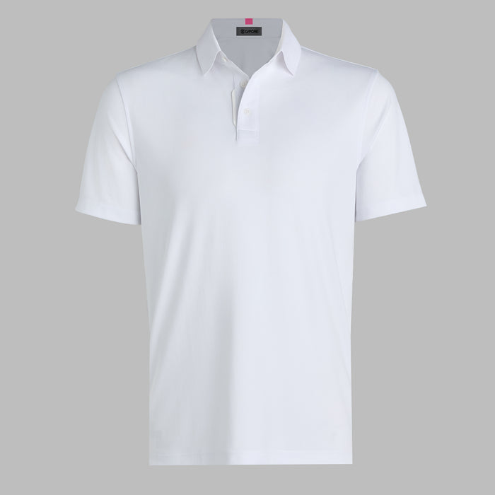 G/FORE Essential Performance Golf Pique Polo in snow white, top button undone