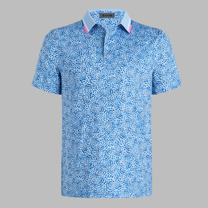 G/FORE Fireworks Tech Jersey Golf Polo Shirt in Baja blue, showing front of polo with pink trim on collar