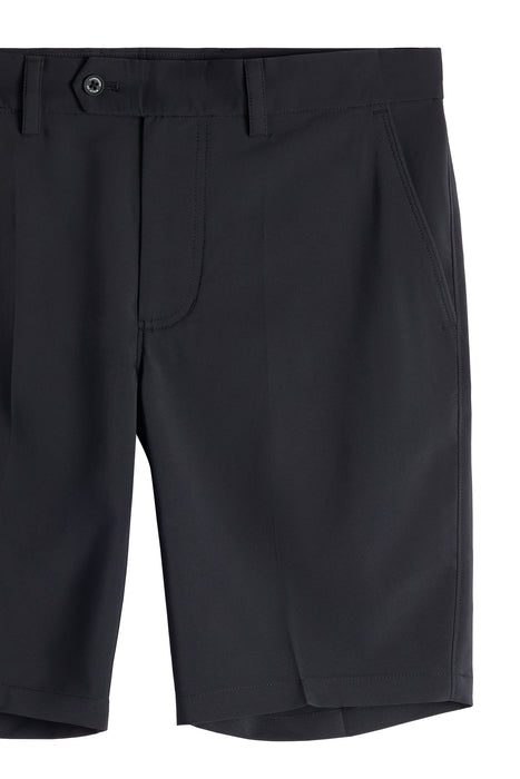 J.Lindeberg Mitch Golf Shorts in black, close up of front of shorts including button and zip