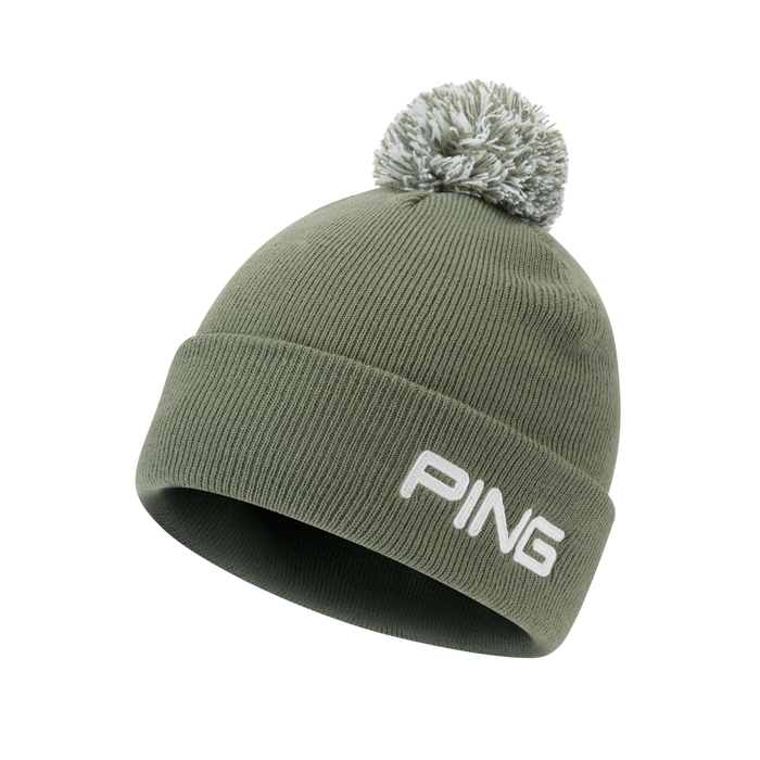 Ping Cresting Knit bobble beanie in laurel green with white embroidered logo and matching pom-pom, side view.