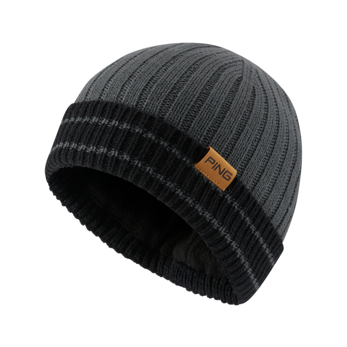 PING Montford golf beanie in asphalt and black with a ribbed knit design and a tan branded side tab.