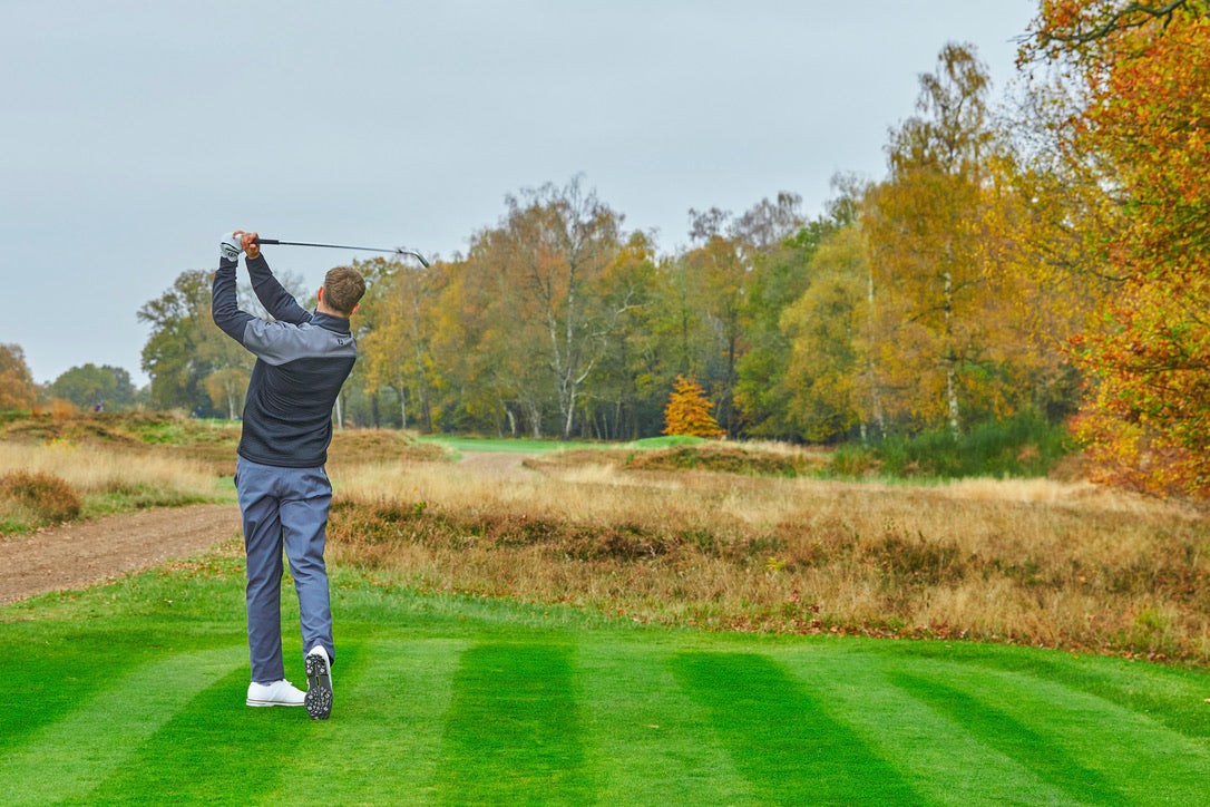 new golf clothing at pin high golf, image includes the new footjoy winter collection being modelled on a golf course