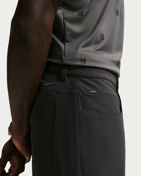Nike Velocity 5 Pocket Golf Trousers in black close up on zipped pocket 