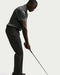 Nike Velocity 5 Pocket Golf Trousers  on model who is hitting a golf shot
