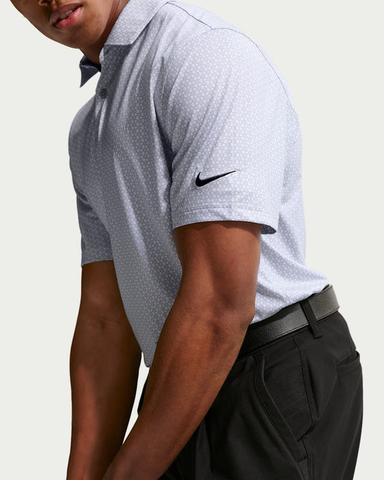 Nike Velocity Dri-FIT Micro Golf Polo Shirt in wolf grey showing the nike logo on golfers arm
