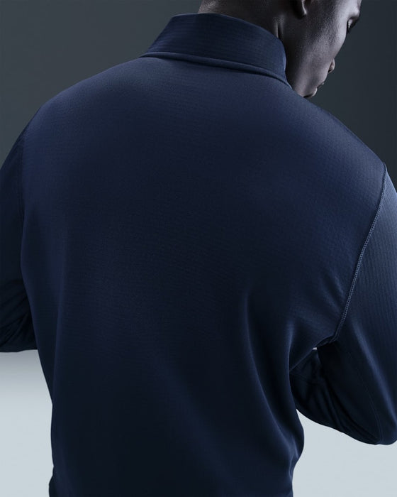 Nike Velocity ThermaFit Golf Half Zip Sweatshirt in navy on the back of the model