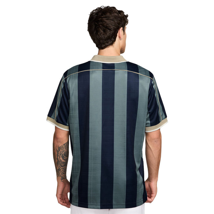 Nike Dri-FIT Fairway Fresh Loose Golf Polo Shirt on back of model