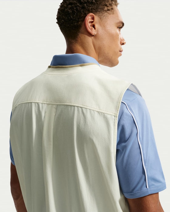 Nike Fairway Fresh Oversized Golf Wind Vest (2026) in beige and white, back of the model