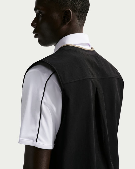 Nike Fairway Fresh Oversized Golf Wind Vest (2026) in black on the back of a model