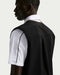 Nike Fairway Fresh Oversized Golf Wind Vest (2026) in black on the back of a model