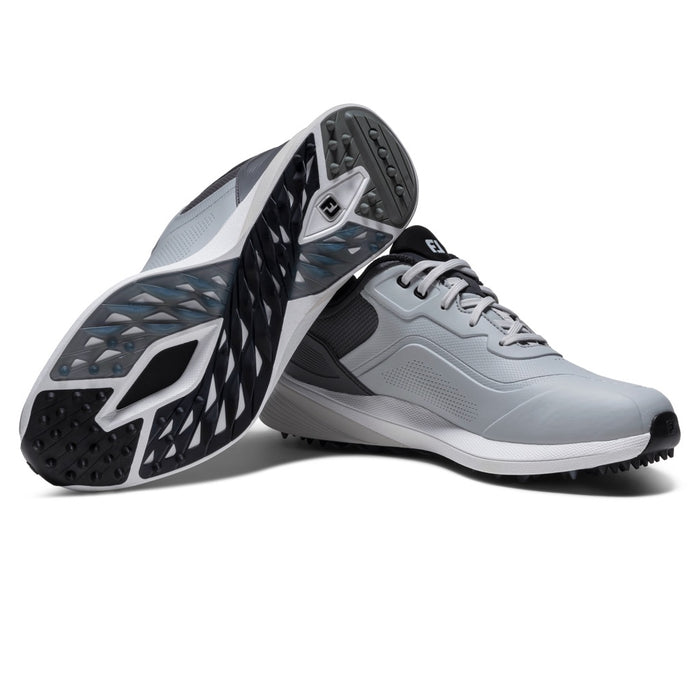 pair of grey FootJoy PRO/SL Spikeless Golf Shoes with one shoe upside down showing sole system
