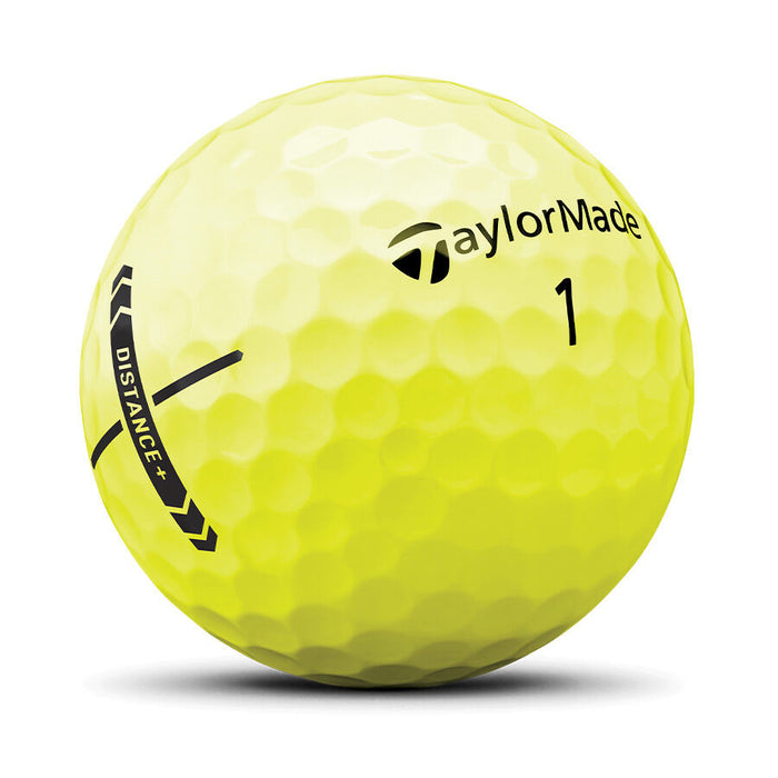 Yellow golf ball with TaylorMade logo on a white background
