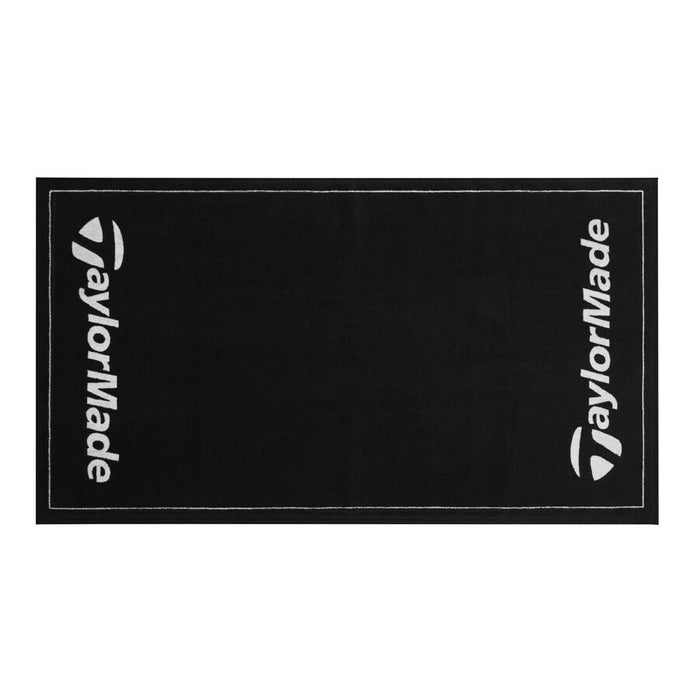 Taylormade Black Tour Golf Towel in black. Towel is spread out so you can see full view