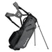 TaylorMade Storm Dry Waterproof Golf Stand Bag in grey black on its stand showing straps