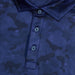 G/FORE Icon Camo Tech Jersey Golf Polo Shirt in navy. close up of the three buttons and g/fore tab