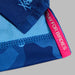 G/FORE Icon Camo Tech Jersey Golf Polo Shirt in blue close up of the pink hem