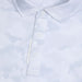 G/FORE Icon Camo Tech Jersey Golf Polo Shirt in white, close up of the 3 buttons and g/fore tab