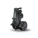 The Motocaddy M1 Electric Golf Trolley 2026 in its folded position on its stand