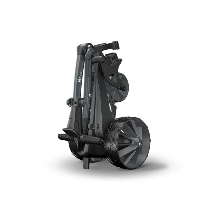Motocaddy M1 DHC Electric Golf Trolley 2026 folded up and on its stand