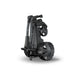 The Motocaddy ME Remote Electric Golf Trolley 2026 folded and on its stand