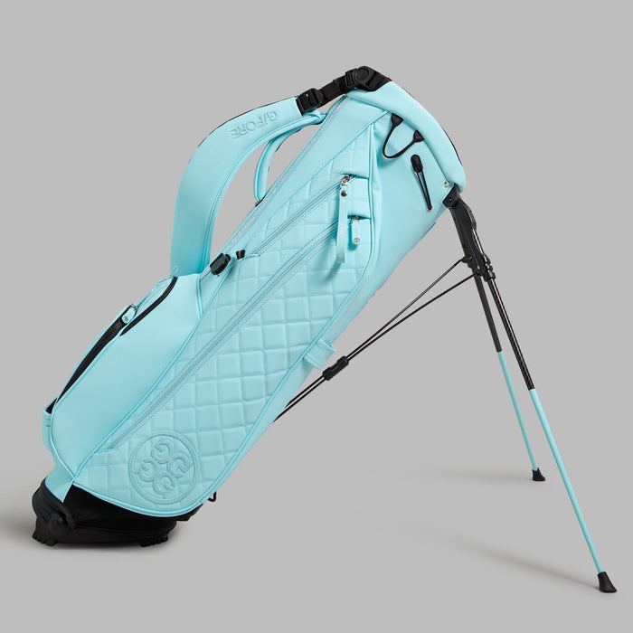 Side profile of the G/FORE Daytona Plus Golf Stand Bag in cenote light blue
