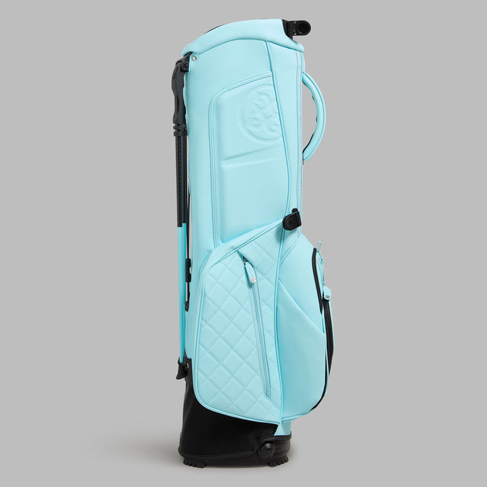 The G/FORE Daytona Plus Golf Stand Bag's back pad with g/fore logo in cenote light blue