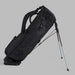 Side profile of the G/FORE Scrambled Skull & Tees Parachute Golf Stand Bag in black