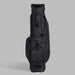 ball pocket and carry handle of the G/FORE Scrambled Skull & Tees Parachute Golf Stand Bag in black