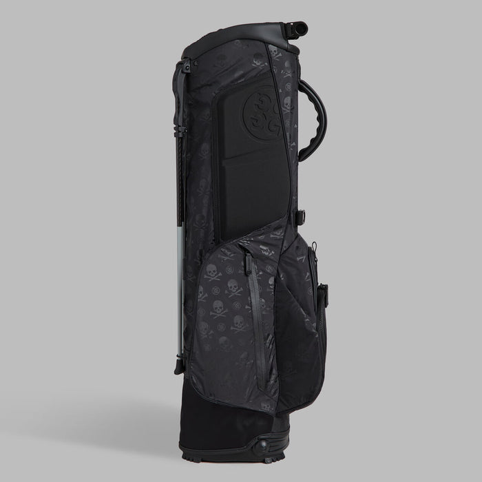 back pad with the gfore logo on the G/FORE Scrambled Skull & Tees Parachute Golf Stand Bag in black