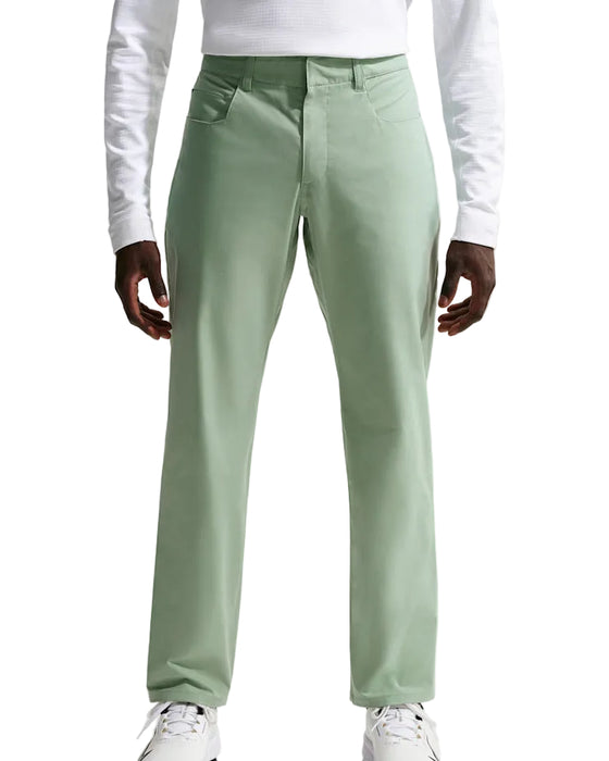 Green Nike Velocity 5 Pocket Golf Trousers on model with nike golf shoes on