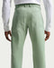 green Nike Velocity 5 Pocket Golf Trousers on model facing away