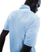 back of a male model wearing the Nike Velocity Solid Golf Polo Shirt in blue