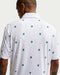 back profile of the Nike Dri-FIT Par 5 Golf Polo Shirt in white and green on man