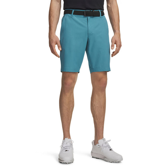 front profile of man model wearing the Under Armour Drive Golf Shorts in blue