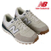 pair of the New Balance 574 V2 SL Golf Shoes in tan