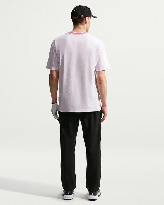 back profile of golfer wearing Nike Retro Golf T-Shirt in pink
