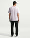 back profile of golfer wearing Nike Retro Golf T-Shirt in pink
