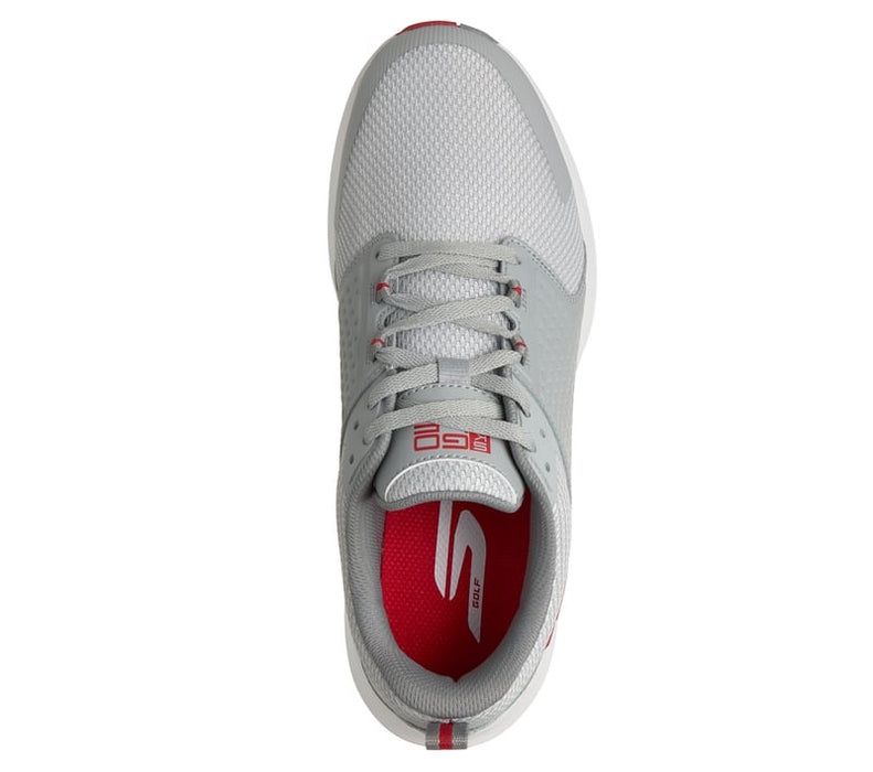 golfers view of right foot of the Skechers Golf Quest Spikeless Golf Shoes in grey with red