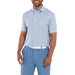 FootJoy Vegas Marker Print Lisle Golf Polo Shirt on a model on blue and peach